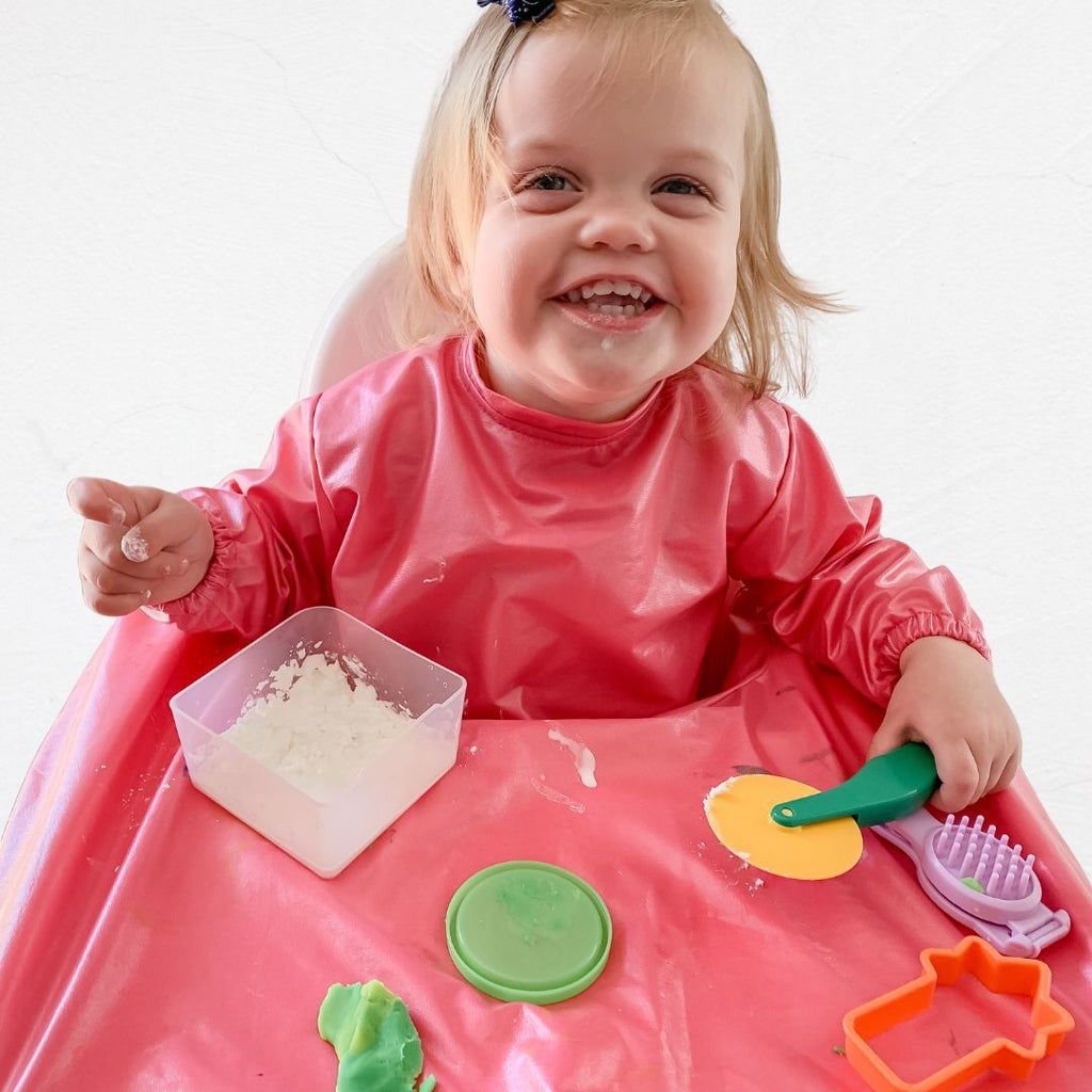 Taste safe baby sensory play. Baby enjoys playing with edible goop.